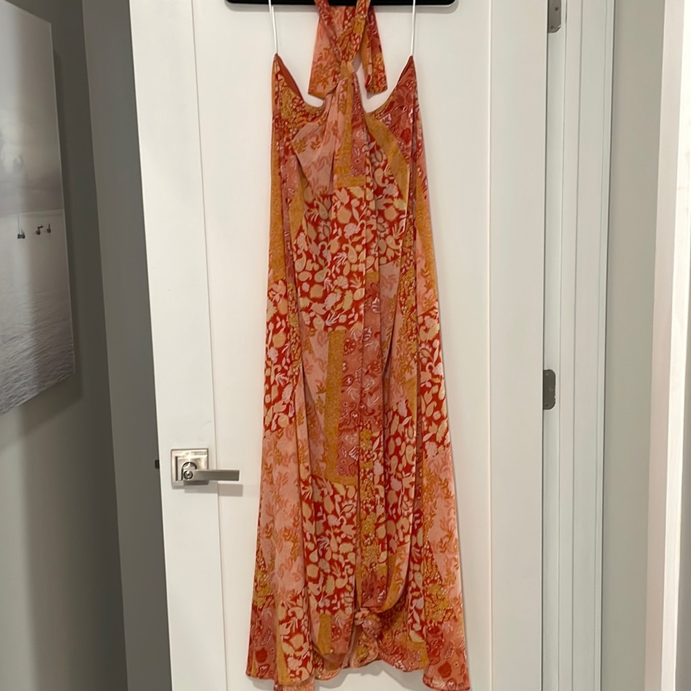 Beautiful boutique dress that can be dressed up or down!